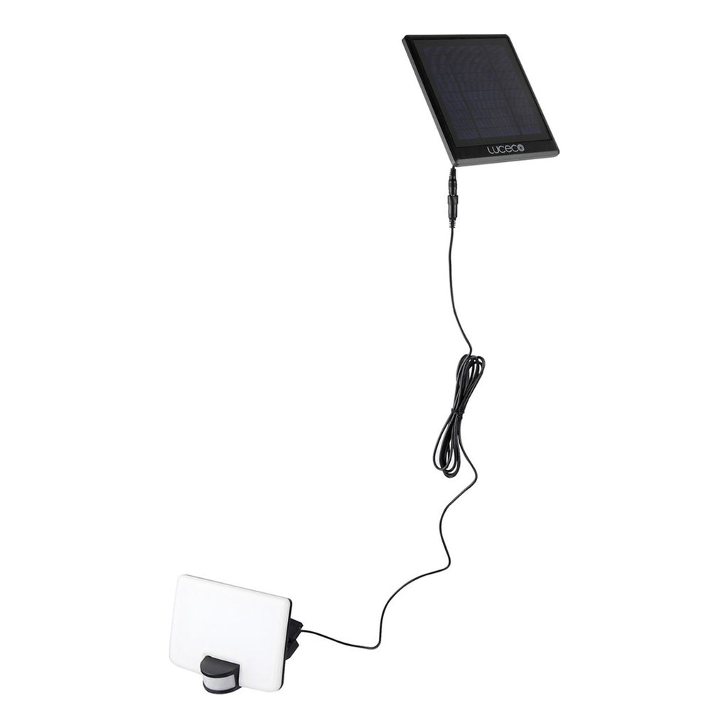 Solar panel with cable attached to a device on a white background