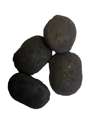 Four burnwell briquettes on a white background