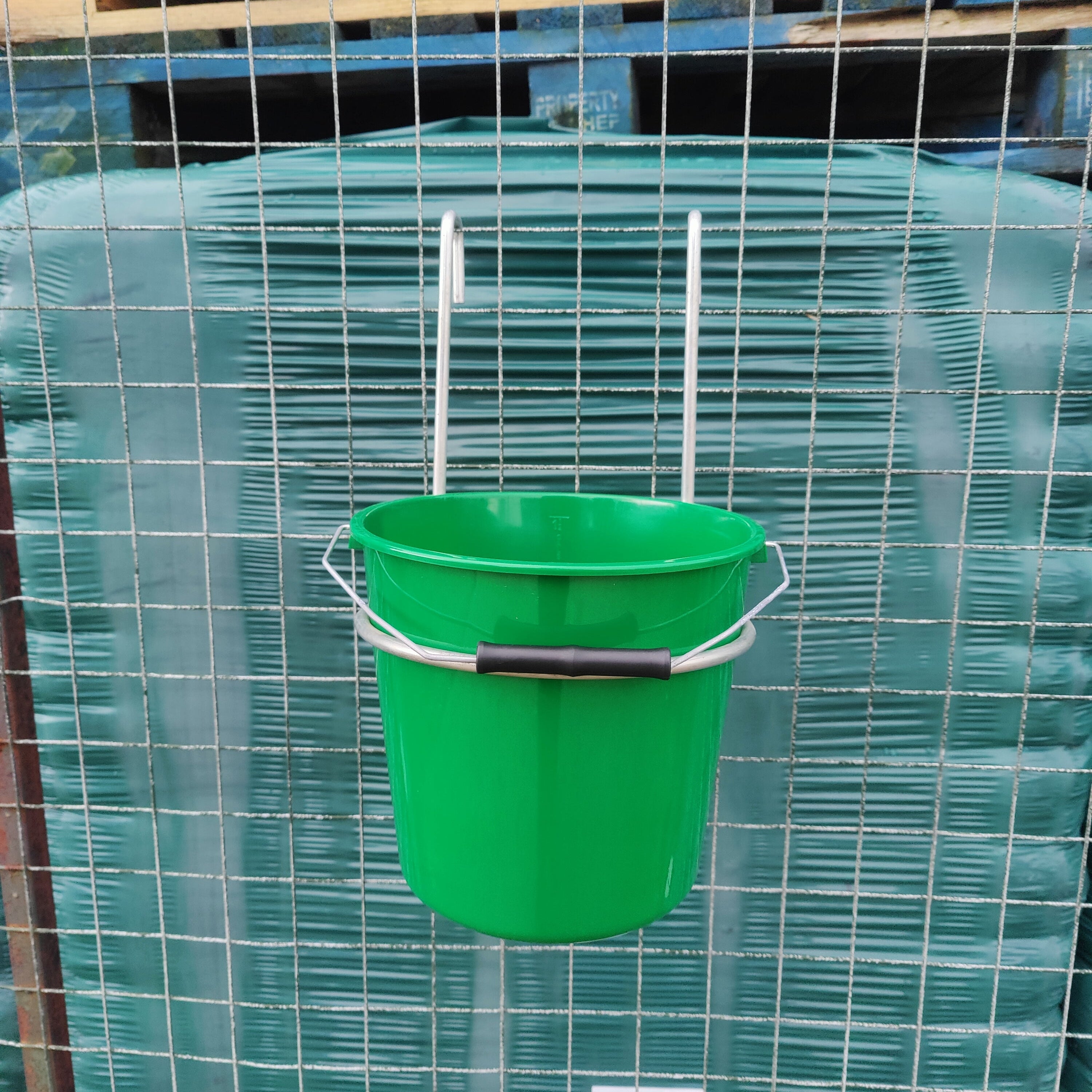 Galvanised Sheep Hurdle Bucket Holder with 5 Litre Green Bucket Tanat Supplies | Agricultural, Building & General Hardware